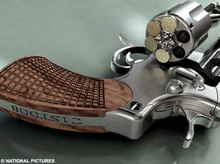 Illustration for article titled World's Smallest Gun Now In Gold and Diamonds, Kills Just the Same